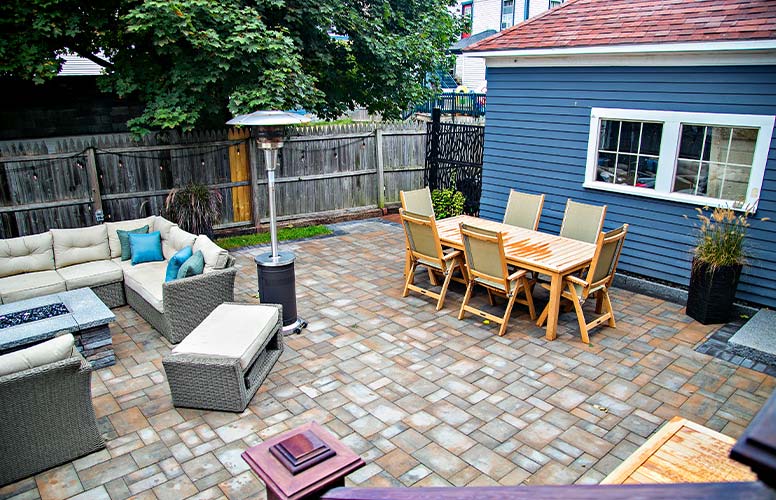 Patio with furniture creating an outdoor living space.