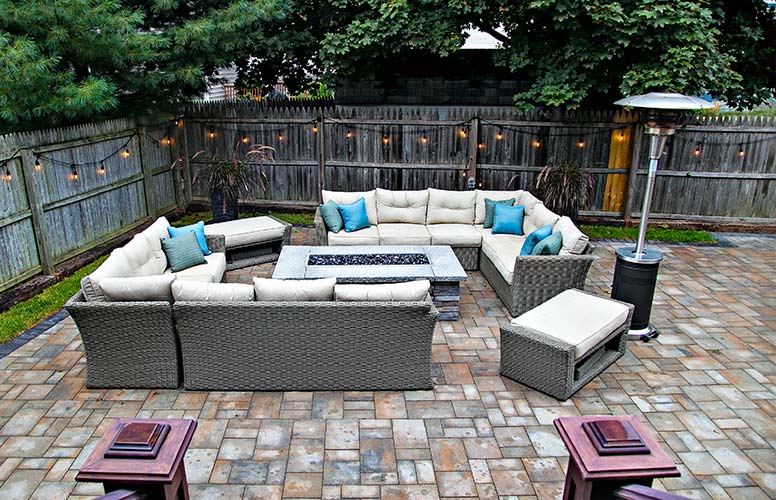 outdoor couch with fire pit in the middle